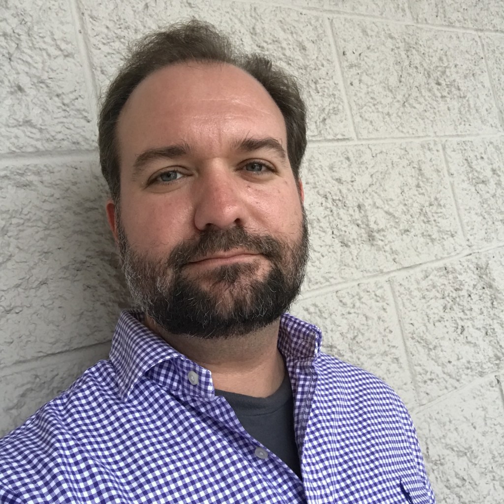 A headshot of poet Jeffrey Heath